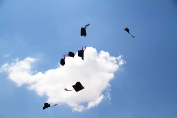Mortar boards in the air Mortar boards in the air