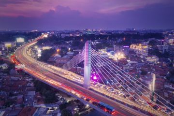 Aerial view of glowing Pasupati overpass at evening in Bandung city Aerial view of glowing Pasupati overpass at evening in Bandung city