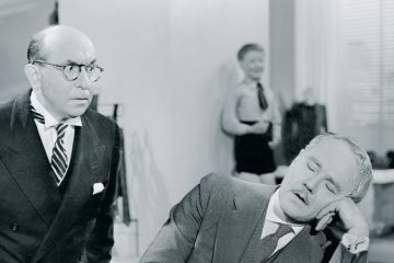 Businessman sleeping at desk Businessman sleeping at desk