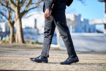 Businessman feet walking Businessman feet walking