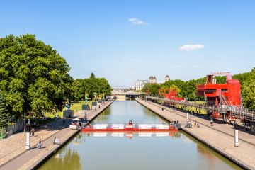 canal de l'Ourcq splitting the parc de la Villette in Paris, France canal de l'Ourcq splitting the parc de la Villette in Paris, France