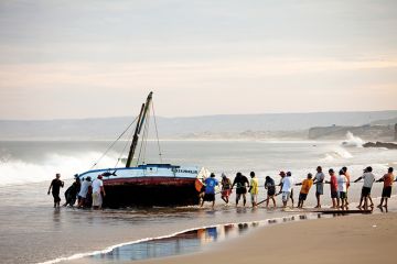 Capsized boat on beach