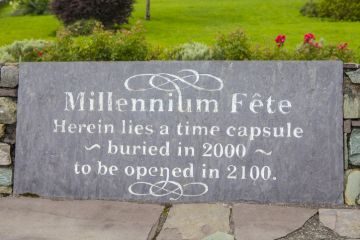 A plaque in the village of Sneem in County Kerry, Ireland, marking where a time capsule was buried during the millennium celebrations in 2000. The capsule will be opened in 2100.
