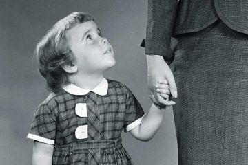Child holding mother's hand Child holding mother's hand