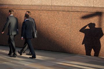 City men walking with shadow City men walking with shadow