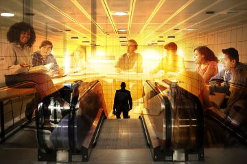 Montage of students in a university seminar and a commuter heading down an escalator. To illustrate work experience as a part of university courses. Montage of students in a university seminar and a commuter heading down an escalator. To illustrate work experience as a part of university courses.