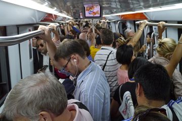 Commuters packed into overcrowded subway train