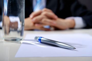 A contract and a pen A contract and a pen