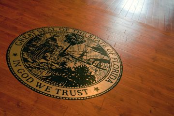 Courtroom seal of Florida illustrating news article about voting rights