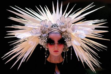 Female model wearing elaborate headdress