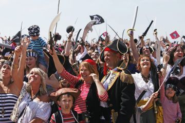 Crowd of people dressed as pirates