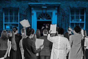 crowd outside 10 Downing Street waving papers. To illustrate how universities can try to gain access to government through policy institutes. crowd outside 10 Downing Street waving papers. To illustrate how universities can try to gain access to government through policy institutes.