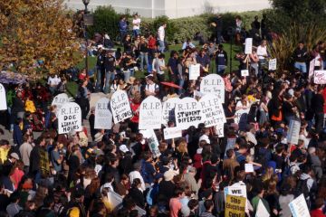 Crowd of protesters hold signs in front of Sproul Hall on UC Berkeley November 18, 2009 Crowd of protesters hold signs and rally tuition increases in front of Sproul Hall on UC Berkeley November 18 2009