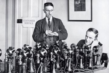 Customer service team answering phones Customer service team answering phones
