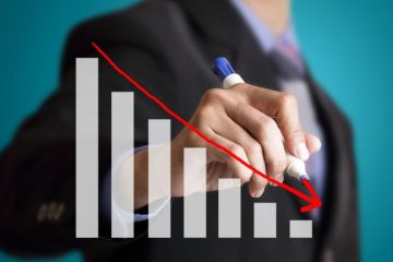 Man drawing decline on a graph