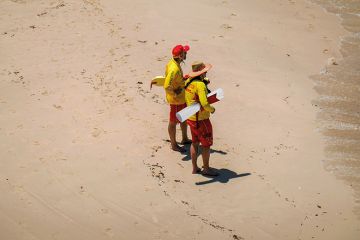 Two lifeguards on Australian beach Two lifeguards on Australian beach