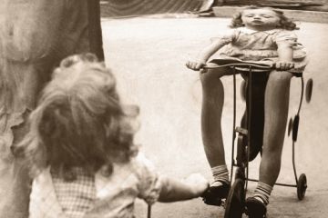 A child looks in a distorted mirror, illustrating the Home Office's immigration rules