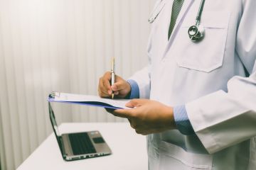 Doctor with clipboard