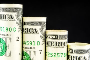 A bar chart of dollars, stepping down, illustrating declining funding for universities A bar chart of dollars, stepping down, illustrating declining funding for universities