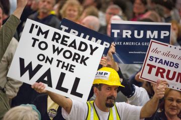 Donald Trump supporters holding placards