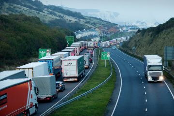 Dover, United Kingdom. 19th October 2021. HGV lorries queue on the M20 motorway just outside Dover, the UK's largest port and the main gateway to the European Union.
