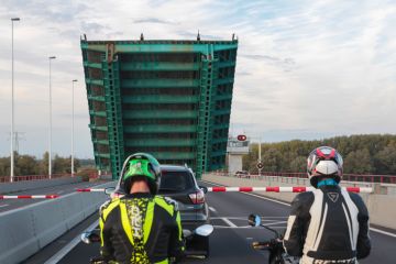 Dutch drawbridge raising to allow shipping through