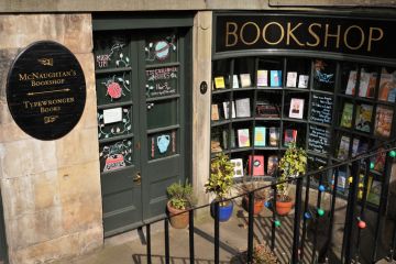 Edinburgh, Scotland - 8 April 2022 A small bookshop, claimed to be Edinburgh's smallest, at basement level near the top of Leith Walk. This shop is well-known for servicing and repairing old, manual, typewriters
