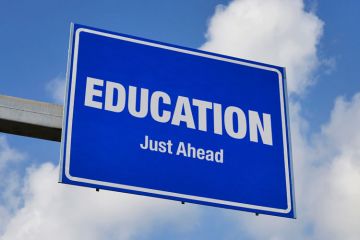 'Education Just Ahead' university advert billboard