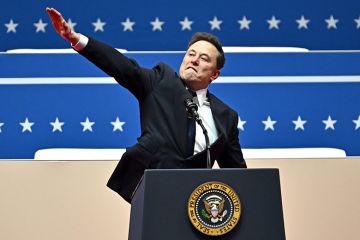 Tesla and SpaceX CEO Elon Musk gestures as he speaks during the inaugural parade inside Capitol One Arena, in Washington, DC, on 20 January 2025 Tesla and SpaceX CEO Elon Musk gestures as he speaks during the inaugural parade inside Capitol One Arena, in Washington, DC, on 20 January 2025