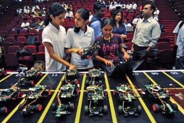 Engineering students prepare smart car race, Bangalore, 2011