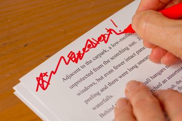 A grade for an essay being crossed out. To illustrate a call for universities to retain coursework but to stop grading it. A grade for an essay being crossed out. To illustrate a call for universities to retain coursework but to stop grading it.