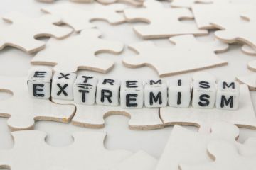 'Extremism' spelled in letter blocks