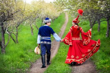 Kazakh couple in fairy tale dress Kazakh couple in fairy tale dress