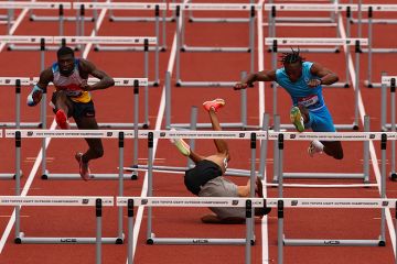 A competitor falls during a hurdles race. To illustrate that the country is “investing so much money in people who…we are not really capable of graduating”, according to Adam Tickell.