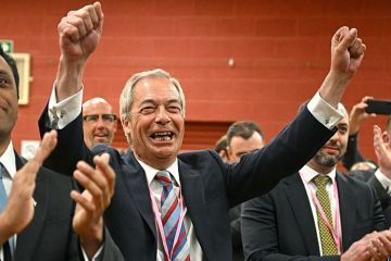 Nigel Farage, leader of the Reform UK party, celebrates the victory of Sarah Pochin, the party's candidate, in the Runcorn & Helsby by-election