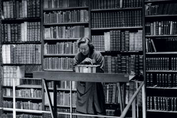 Female librarian at work