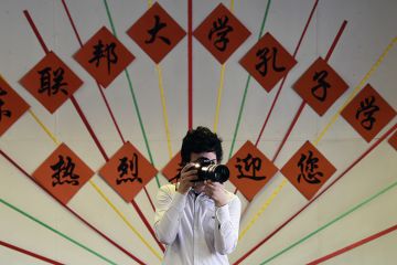 A photographer with a camera A photographer with a camera