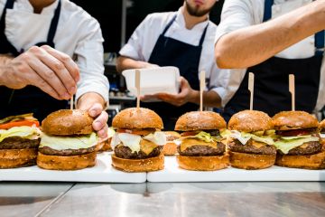 front view of many delicious juicy hamburgers