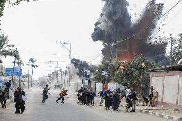 A bomb explodes in Gaza, illustrating the war's threat to academic freedom