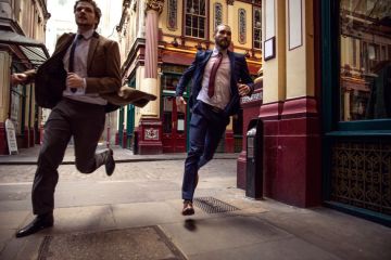 Businessmen in a rush in the city of London Businessmen in a rush in the city of London