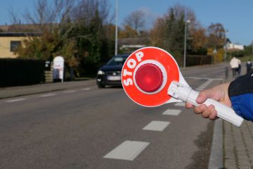 A stop sign at a pedestrian crossing in Denmark A stop sign at a pedestrian crossing in Denmark