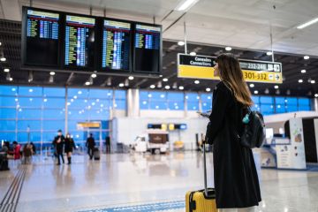 Young woman in the airport Young woman in the airport