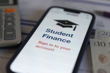 Smartphone with Student finance app. Smartphone with Student finance app.