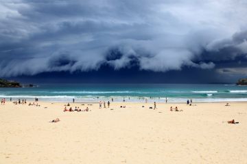 Beach goers enjoy the last rays of sunshine before a massive storm sweeps through Sydney Beach goers enjoy the last rays of sunshine before a massive storm sweeps through Sydney