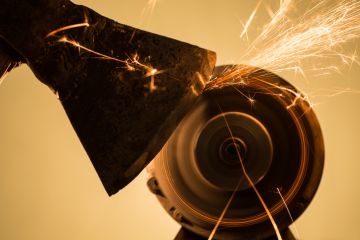 Close-up of axe sharpening