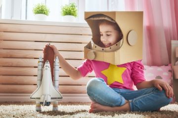 Girl in astronaut costume