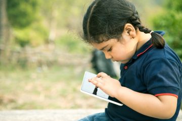 Girl with tablet computer