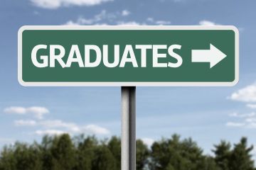 Graduates sign