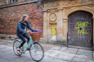 The Gate of Honour at Gonville & Caius College, Cambridge, spray painted with the with words 'Eugenics is genocide. Fisher must fall' by activists calling for the college to remove its memorial window to Ronald Fisher The Gate of Honour at Gonville & Caius College, Cambridge, spray painted with the with words 'Eugenics is genocide. Fisher must fall' by activists calling for the college to remove its memorial window to Ronald Fisher