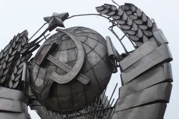 Hammer and sickle symbol on metal sculpture